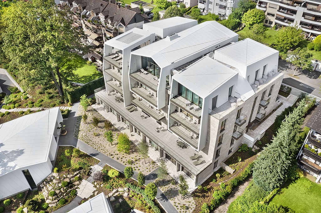 Dachflächen des Boardinghouses Alea Park mit räumlicher Schalentragwirkung für schlanke Bauteile.